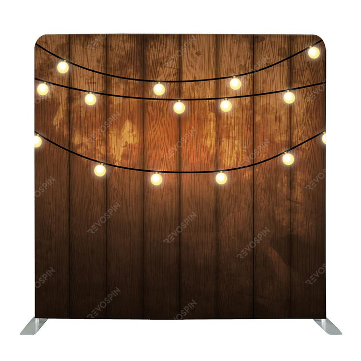 String Light on Rustic Wood Tension Backdrop